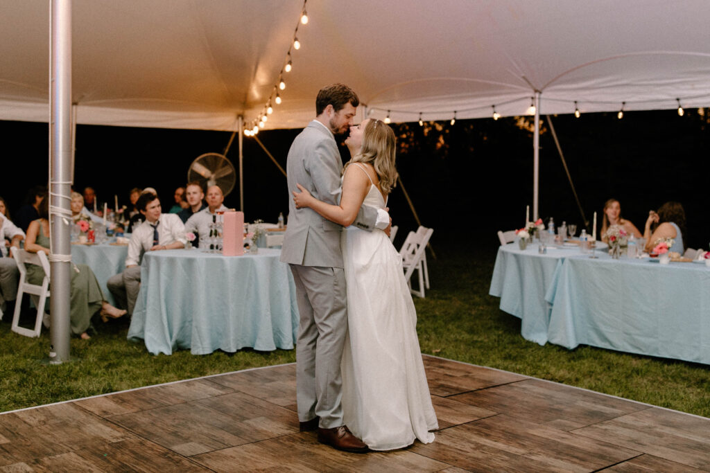 couple dancing at intimate backyard wedding reception